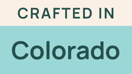 A two-tone rectangular badge that says "CRAFTED IN COLORADO"